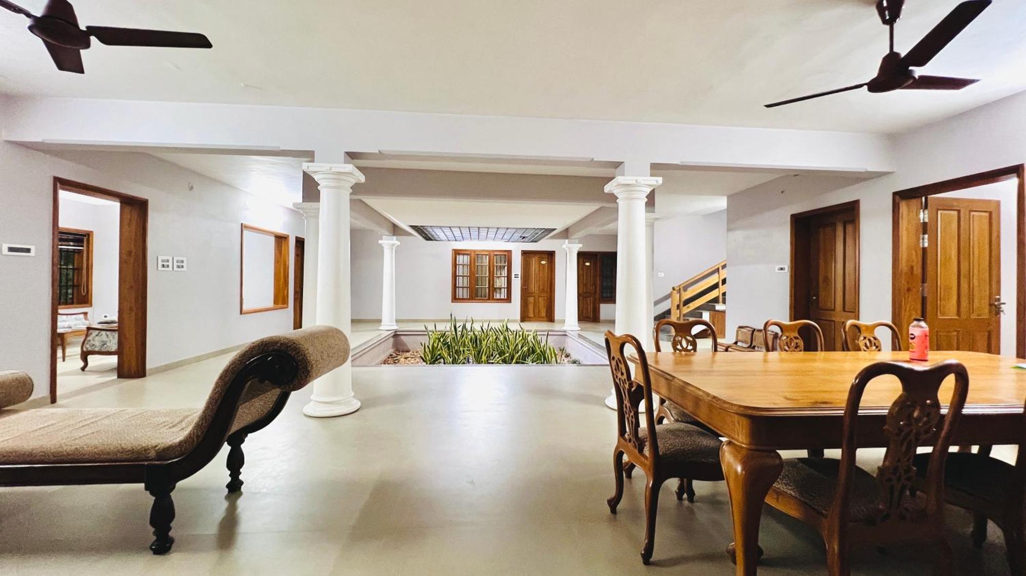 Waterfront By Palmyra Apartment Kollam Exterior photo